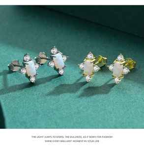 Macro shot of S925 sterling silver opal stud earrings in silver and gold finishes