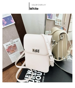 Detailed side view of white mini phone bag with Saffiano texture and silver twist lock