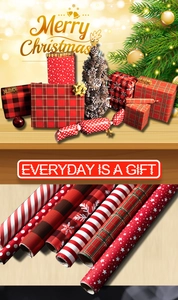 Detail of red plaid and snowflake Christmas wrapping paper rolls for festive gift packaging