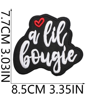 Detail view of embroidered letter patch with heart and dimensions 8.5cm x 7.7cm