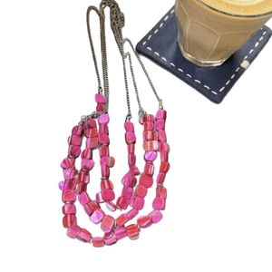 Bohemian multilayer rose pink shell beaded necklace with layered strands for beach vacations