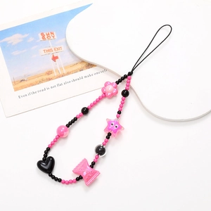 Handcrafted graffiti beaded phone strap with pink floral charms and black heart pendant