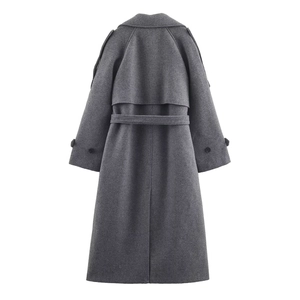 Back view of a long grey wool coat featuring a waist belt and professional minimalist cut