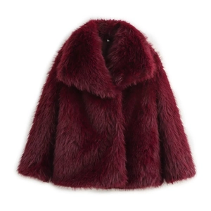 Detail of burgundy faux fur coat showing plush texture and wide lapels on white background