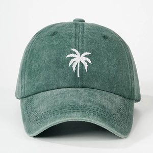 Vintage washed green baseball cap with white palm tree embroidery and adjustable strap