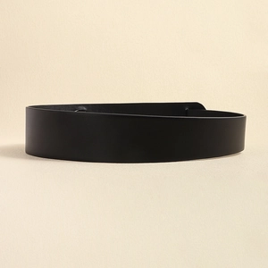 Detail view of a black wide leather corset belt for women, featuring smooth premium texture