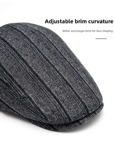 Detail of gray striped beret featuring a foldable brim design for men in autumn