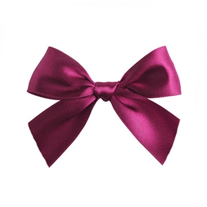 Polished dark magenta satin ribbon bow for gift wrapping and DIY hair accessories