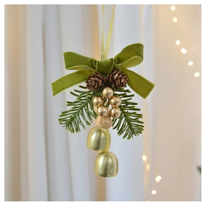 Detail of Christmas bell ornament with olive green velvet bow, pine cones and golden berries
