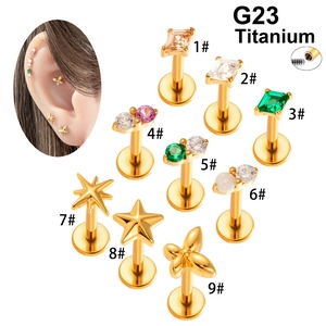 G23 Titanium star and gemstone piercing studs set in gold finish for ear and lip