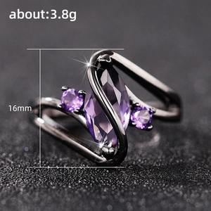 Fashion gun black ring featuring marquise cut purple gemstone and zircon accents