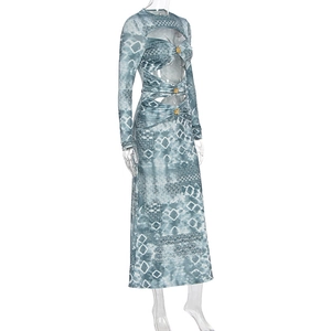 Detail of blue-grey geometric print maxi dress with waist cut-outs and metal buckles
