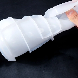 Close-up of flexible spiral silicone mold showing high elasticity and texture