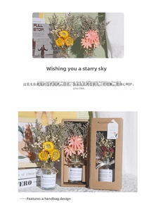 Close-up of dried sunflower and daisy floral gift set in a glass bottle and gift box