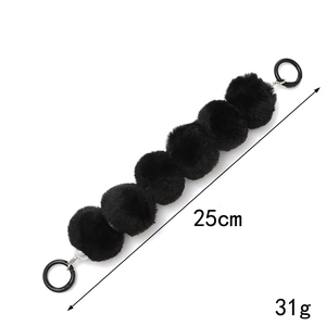 Short 25cm black faux fur ball beaded wrist strap for phone or bag with pearl detail