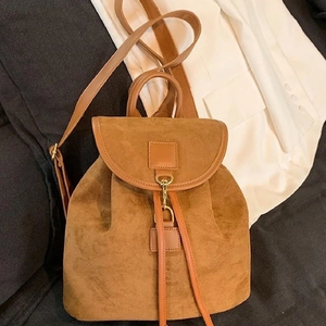 Vintage brown suede leather backpack for women with metal buckle and drawstring closure