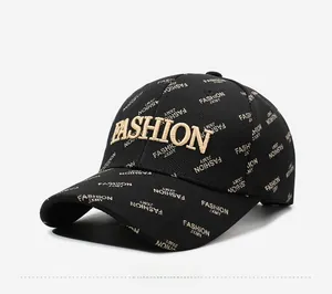 Close-up of black baseball cap with 3D letter embroidery and all-over fashion print
