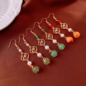 Detailed set of five vintage Chinese flower earrings with pearls and pumpkin beads