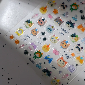 3D jelly nail stickers featuring cute cartoon cats, paws and fruits on a white background