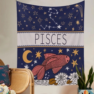 Detail of Pisces constellation wall tapestry in navy and gold above a cozy chair setup