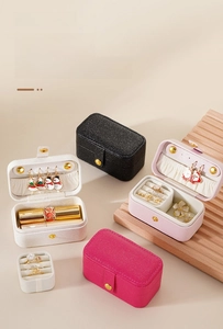 Mini travel jewelry box in PU leather with compartments for rings and lipsticks