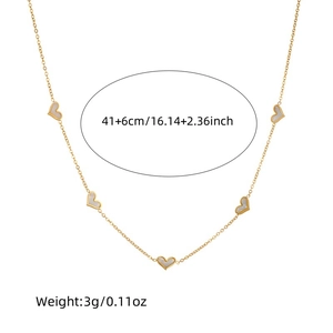 Gold stainless steel heart necklace with white shell pendants and extension chain