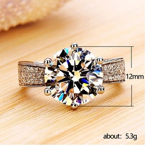Classic six-prong ring with 12mm round cubic zirconia and micro-pavé band details