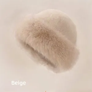 Detailed view of beige plush faux fur bucket hat with thick warm texture for winter