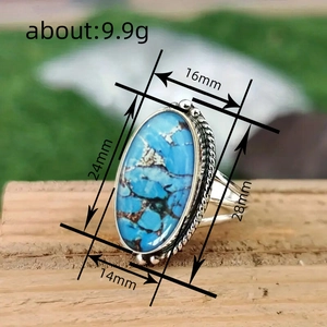 Vintage silver-tone twist ring with oval faux marble turquoise stone and detailed metalwork