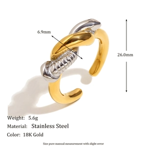 Macro detail of twisted mixed-tone stainless steel ring with 18K gold plating and measurements