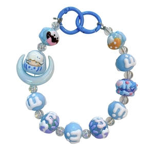 Adorable blue moon beaded keychain with cute character charm for bag or phone accessories