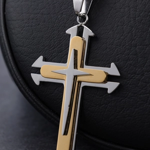 Two-tone stainless steel layered cross pendant necklace for men on black leather display