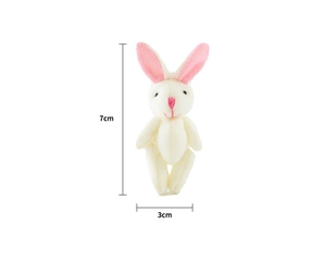 Dettagli sulle dimensioni del coniglio di peluche bianco: altezza 7 cm e larghezza 3 cm