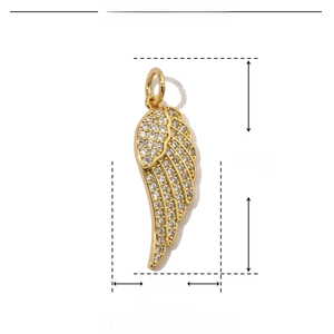 Detail of angel wing pendant in gold-plated copper with white zircon stones