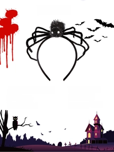 Detail view of black furry spider headband for Halloween party decoration and props.