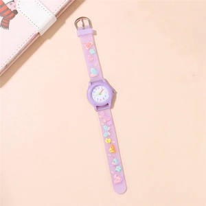 Detailed view of kids purple watch with butterfly patterns on transparent plastic strap