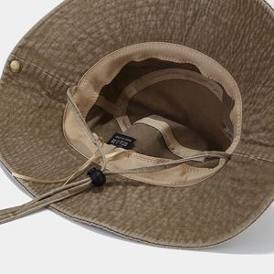 Khaki cotton cowboy bucket hat with adjustable chin strap and side press studs