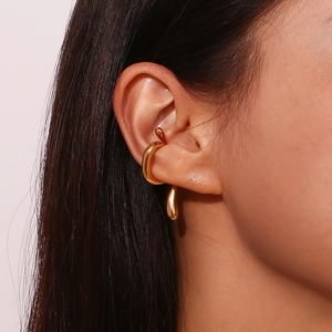 Irregular liquid metal style ear cuff in 18K gold plated stainless steel on ear