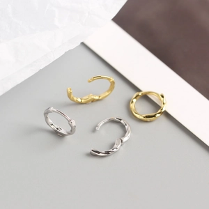 Minimalist S925 sterling silver twisted hoop earrings in gold and silver finish
