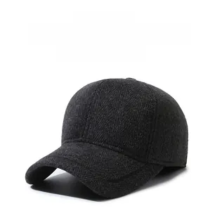 Close-up of winter baseball cap showing wool-like texture and SPORTS metal tag