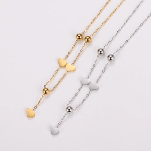 Polished 18K gold and silver heart tassel necklaces with beads on minimalist chains