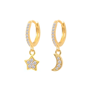 Detailed close-up of S925 sterling silver asymmetrical star and moon earrings with zircons