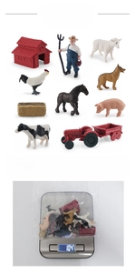 Miniature farm life set with red tractor, barn, farmer, and 11 assorted animals figurines
