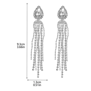 Boucles d'oreilles pendantes argentées de luxe avec strass étincelants et franges