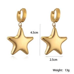 Detail view of gold star dangle earrings showing 4.5cm height and 2.5cm width dimensions