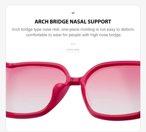 Detail of integrated arch bridge nasal support on magenta curved lens sunglasses