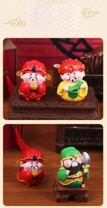 Detailed view of 4 mini Chinese deities figurines for wealth and home desk decoration
