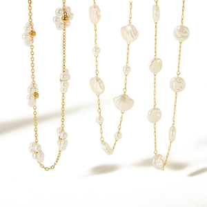 Elegant 18k gold plated titanium steel necklaces with baroque pearls and floral charms