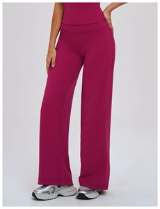 High-waisted magenta flared yoga pants featuring flatlock stitching and brushed fabric