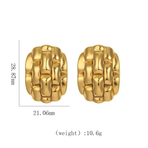 Macro detail of 18k gold stainless steel hoop earrings with woven texture and dimensions